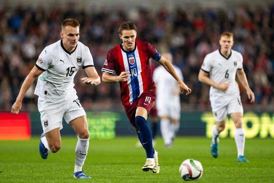 Philipp Lienhart of Austria and Martin Ødegaard of Norway