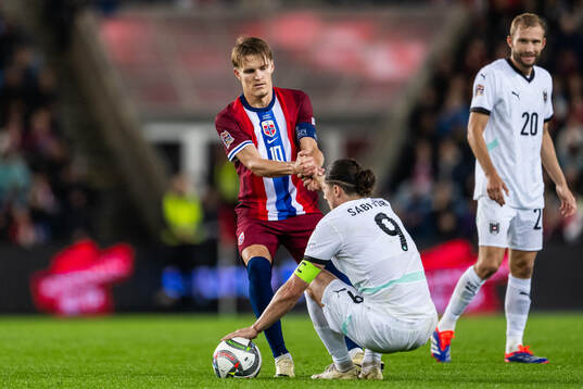 Martin Ødegaard of Norway and Marcel Sabitzer of Austria