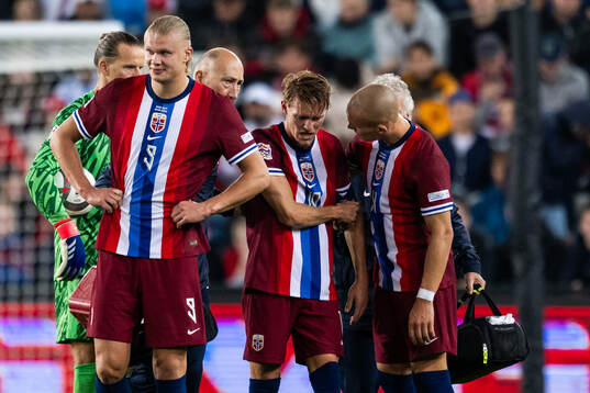 Martin Ødegaard of Norway leaves the pitch due to injury