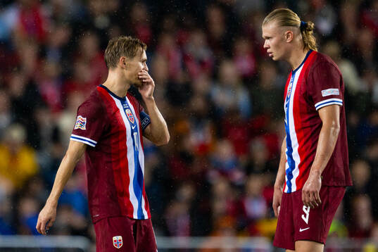 Martin Ødegaard and Erling Braut Haaland of Norway look