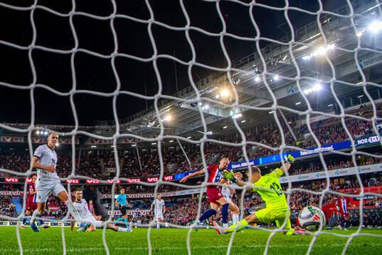 Erling Braut Haaland of Norway scores the 2-1 goal behind