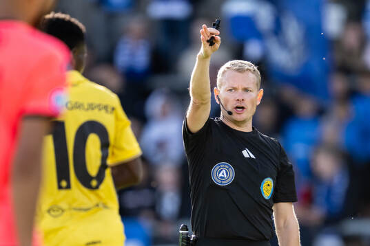 Domare Fredrik Klitte