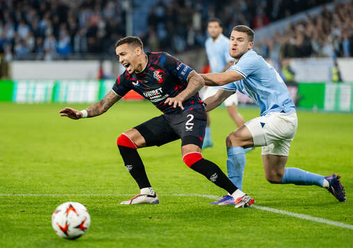 James Tavernier of Rangers and Gabriel Busanello of Malmö