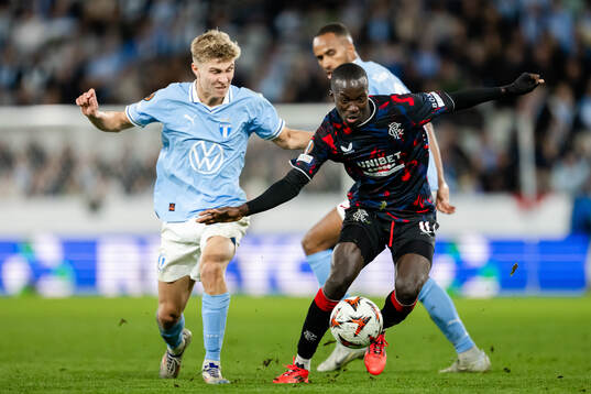 Hugo Bolin of Malmö FF and Mohamed Diomande of Rangers