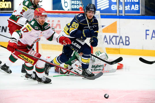 MoDos Riley Woods och HV71s Andre Petersson
