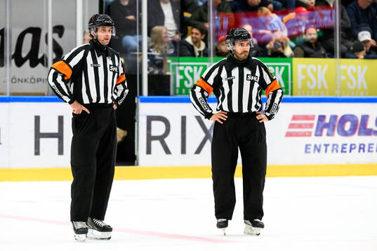 Domare Johan Wedin och Mattias Enroth