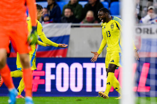 Yasin Ayari and Ken Sema of Sweden celebrate