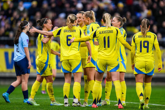 Players of Sweden celebrate