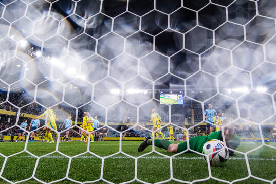Goalkeeper Lucie Schlime of Luxembourg looks dejected