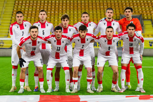 The starting eleven of Georgia pose for a photo