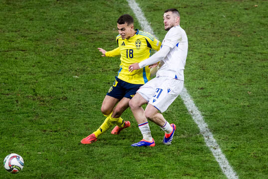 Yasin Ayari of Sweden and Matus Bero of Slovakia
