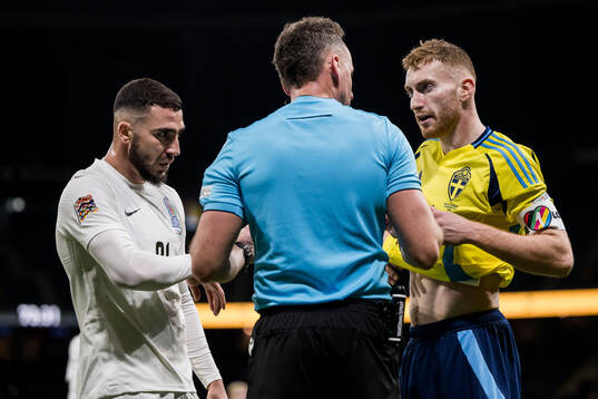 Elvin Jamalov of Azerbaijan and Dejan Kulusevski of Sweden