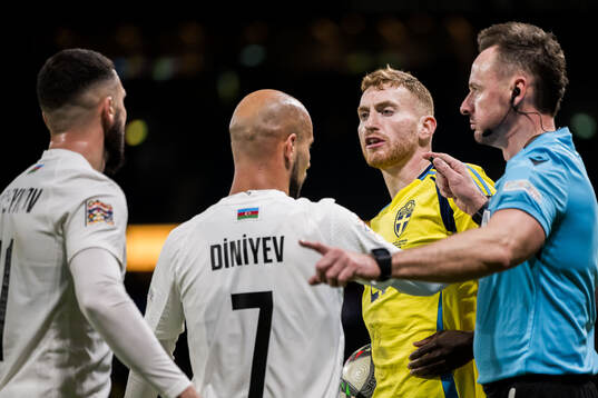 Dejan Kulusevski of Sweden and Elvin Jamalov of Azerbaijan