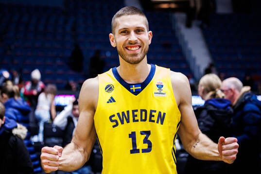 Christopher Czerapowicz of Sweden celebrates