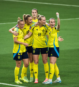 Stina Blackstenius and Kosovare Asllani of Sweden