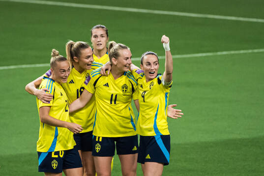 Stina Blackstenius and Kosovare Asllani of Sweden