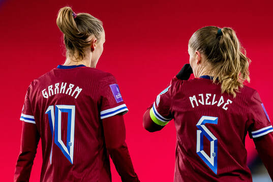 Caroline Graham Hansen and Maren Mjelde of Norway
