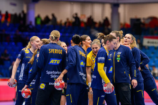 Carin Strömberg and Linn Blohm of Sweden with teammates