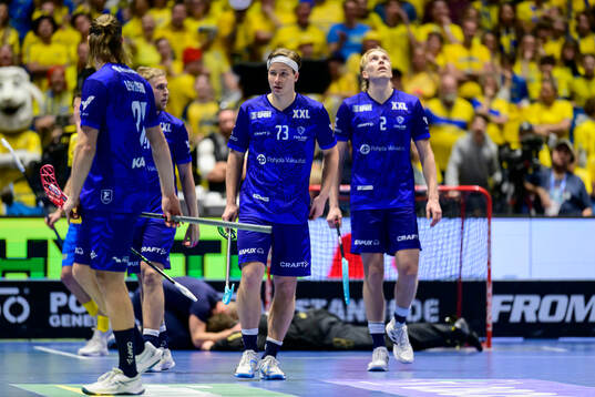 Justus Kainulainen and Aaro Astala of Finland look dejected