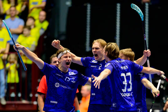 Justus Kainulainen and Aaro Astala of Finland celebrate the
