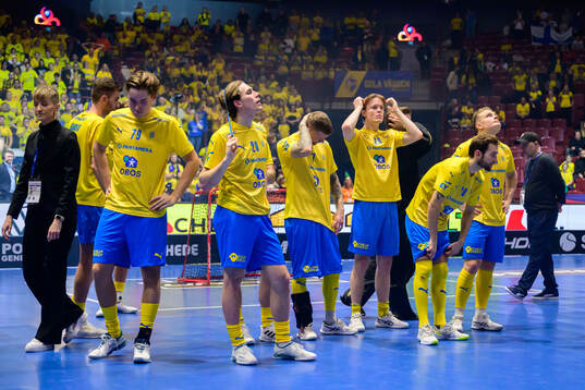 Players of Sweden look dejected