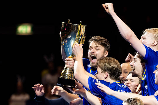 Nico Salo of Finland celebrates with the trophy