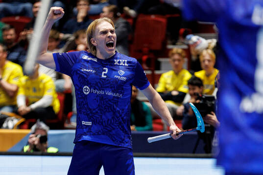 Aaro Astala of Finland celebrates the 4-4 goal