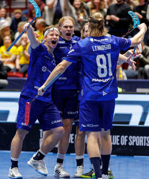 Justus Kainulainen and Aaro Astala of Finland celebrate the
