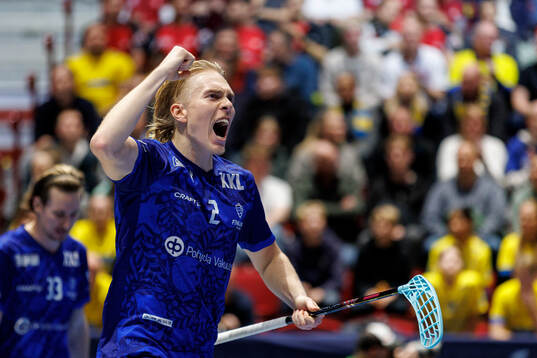Aaro Astala of Finland celebrates the 4-4 goal