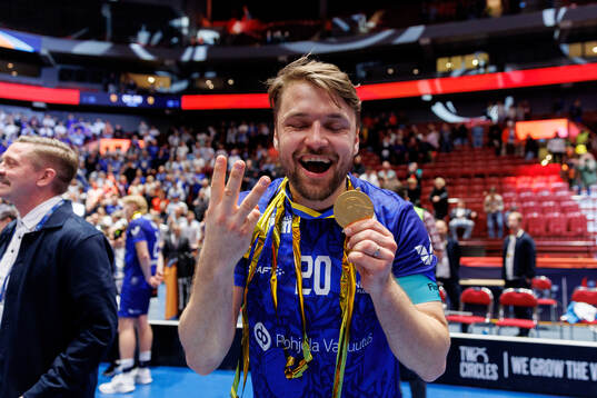 Nico Salo of Finland celebrates with the gold medal