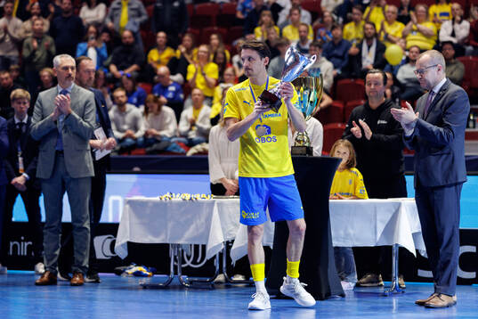Emil Johansson of Sweden with the trophy