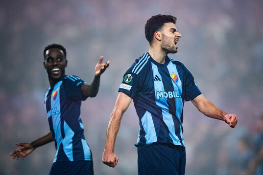 Tokmac Nguen and Deniz Hummet of Djurgården celebrate