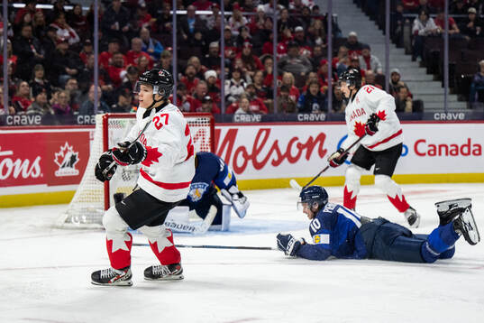 Easton Cowan of Canada celebrates