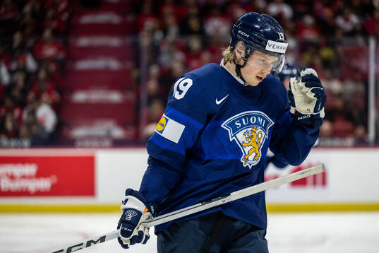 Konsta Helenius of Finland looks dejected