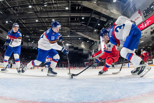 Lukas Klecka and Milan Pisoja of Slovakia compete for the