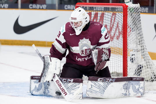 Goaltender Linards Feldbergs of Latvia