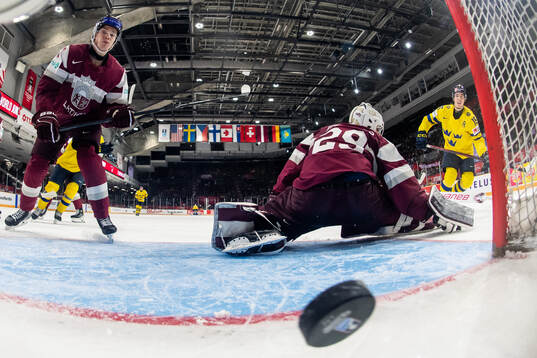 David Edstrom of Sweden scores 3-0 bahind goaltender