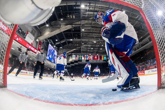 Goaltender Samuel Urban of Slovakia looks dejected