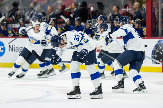 Aron Kiviharju of Finland celebrates