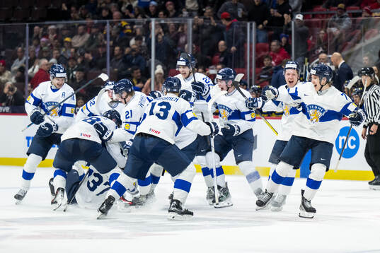 Players of Finland celebrate