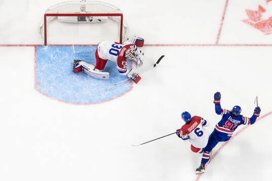 goaltender Michael Hrabal and Jakub Dvorak of Czech
