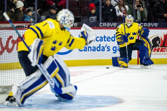 Goaltender Melker Thelin of Sweden