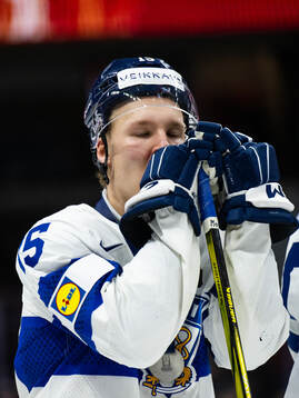 Toumas Uronen of Finland looks dejected