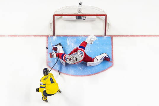 Goaltender Michael Hrabal of Czech Republic makes a save