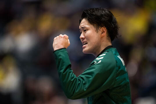 Goalkeeper Takumi Nakamura of Japan celebrates