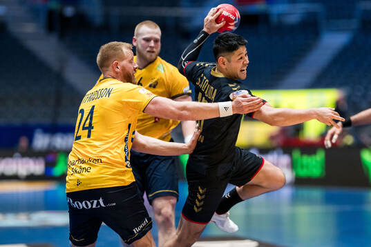 Jim Gottfridsson of Sweden and Shinnosuke Tokuda of Japan
