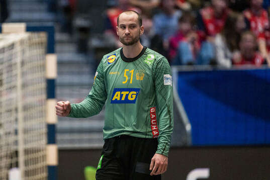 Goalkeeper Fabian Norsten of Sweden celebrates