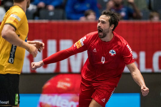 Erwin Feuchtmann of Chile celebrates
