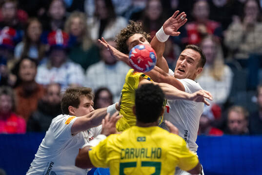 Acacio Filho of Brazil competes for the ball with Jonas