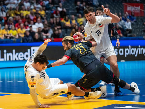Daniel Ayala and Benjamin Illesca of Chile defend against
